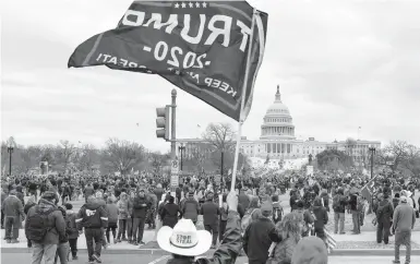  ?? KENNY HOLSTON/THE NEW YORK TIMES ?? Supporters of then-President Trump converge Jan. 6 on the U.S. Capitol. Before a hearing scheduled for Wednesday, members of a House committee asked cable companies what they did to combat“the spread of misinforma­tion.”