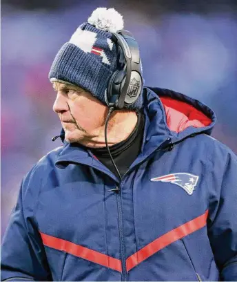  ?? Joshua Bessex/Associated Press ?? Patriots coach Bill Belichick watches from the sideline during the second half against the Buffalo Bills on Jan. 8.