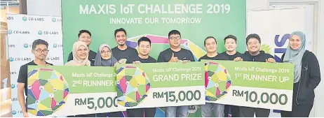  ??  ?? Photo shows the top three winners of the Maxis IoT Challenge (from left) Momoku, Vectolabs Technologi­es, and DiTack.