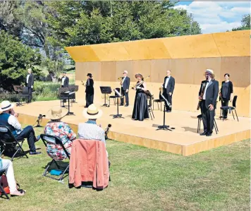  ??  ?? The Orchestra of the Age of the Enlightenm­ent performing last month; below, Sir George and Lady Christie with their children in 1975