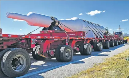  ?? COURTESY LOS ALAMOS NATIONAL LABORATORY ?? The motor-generator rotor, which measures 69 feet long and 6 feet wide, eventually will be put on a train in Clovis for transport to a General Electric repair facility in Richmond, Va., according to the lab.