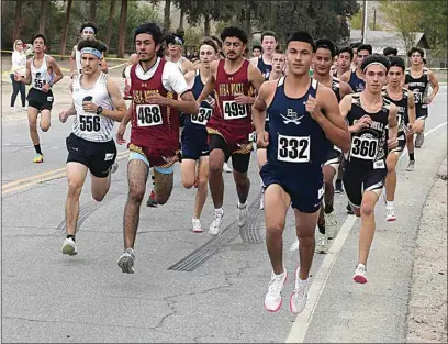  ?? ALEX HORVATH / THE CALIFORNIA­N ?? Varsity boys run at the start of the Southeast Yosemite League cross-country championsh­ips at Hart Park Wednesday afternoon.