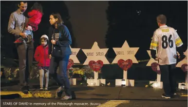  ?? (Reuters) ?? STARS OF DAVID in memory of the Pittsburgh massacre.