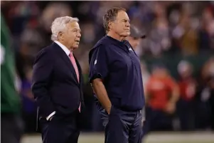  ?? The Associated Press ?? ■ New England Patriots owner Robert Kraft, left, talks to head coach Bill Belichick as their team warms up before an Oct. 21, 2019, NFL game against the New York Jets in East Rutherford, N.J. Belichick never was one to spent wildly in free agency. But after watching Tom Brady celebrate another Super Bowl in another city, Belichick and his boss, Robert Kraft, had seen enough.