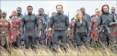  ?? AP PHOTO ?? This image released by Marvel Studios shows, front row from left, Danai Gurira, Chadwick Boseman, Chris Evans, Scarlet Johansson and Sebastian Stan in a scene from “Avengers: Infinity War,” premiering on April 27.