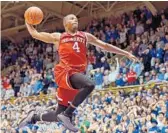  ?? GRANT HALVERSON/GETTY IMAGES ?? NC State’s Dennis Smith Jr. has two triple-doubles in ACC play this season — a league first for a freshman.