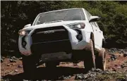  ?? Toyota photo ?? Technology is put to work in the 4Runner TRD Pro. An example is the standard hill-start assist, which holds the four-wheel-drive SUV in place when the vehicle’s pointed uphill and the driver lets off the brakes to accelerate.