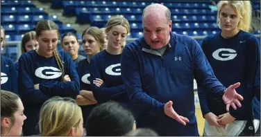  ?? (River Valley Democrat-Gazette/Hank Layton) ?? Greenwood girls Coach Clay Reeves speaks to his team during a game earlier this season. The Lady Bulldogs host Russellvil­le tonight in a key 5A-West Conference girls game.