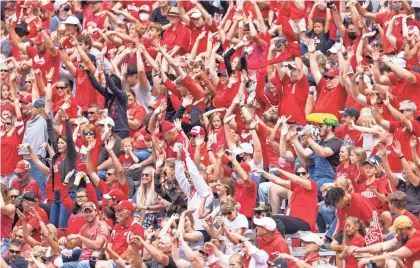  ?? REBECCA S. GRATZ/AP ?? Despite four consecutiv­e losing seasons, Nebraska football continues to draw big crowds in Lincoln. A packed house did the wave a couple weeks ago during Nebraska’s win against Fordham.