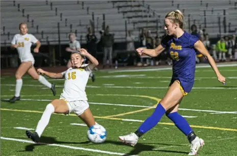  ?? Emily Matthews/Post-Gazette ?? Kaitlyn Killinger, right, led Plum in scoring during the regular season with 27 goals.