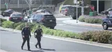  ??  ?? Police officers are seen at Youtube headquarte­rs following an active shooter situation in San Bruno. — Reuters