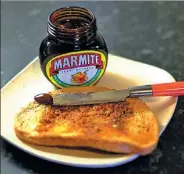  ?? REUTERS ?? Toast with Marmite sits on a kitchen counter in Manchester, Britain. Experiment­s found Marmite may be good for brain.