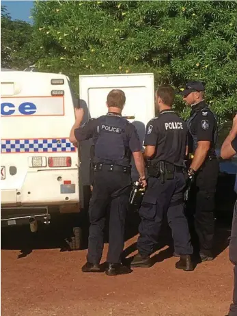  ??  ?? BUSTED: Police arrest an alleged drug trafficker after massive raids in St George, Roma and Dirranband­i yesterday. PHOTO: QPS