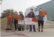  ?? Terry Tang / Associated Press ?? Activists protest against the execution of the only Native American on federal death row, in Phoenix.