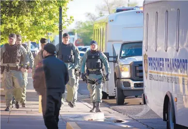  ?? MARLA BROSE/JOURNAL ?? Security was tight when members of the Syndicato de Nuevo Mexico prison gang were transporte­d to U.S. District Court in Albuquerqu­e for a pre-trial hearing in 2016.