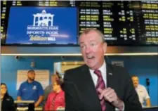  ?? NOAH K. MURRAY — THE ASSOCIATED PRESS ?? New Jersey Governor Phil Murphy, arrivers to make the first wager with Monmouth Park Sports Book at Monmouth.