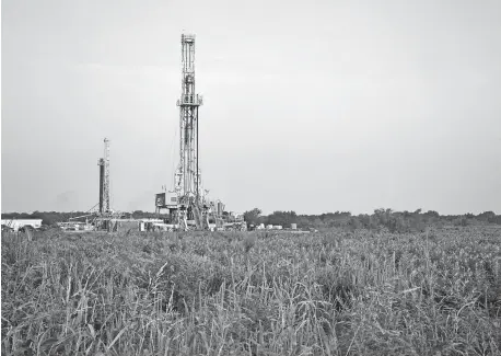  ?? [THE OKLAHOMAN ARCHIVES] ?? Rigs drill wells on leases in the STACK play of the Anadarko Basin in 2018. Brook Simmons, executive director of the Petroleum Alliance of Oklahoma, expects the energy industry across Oklahoma and the nation to recover, he said this week.