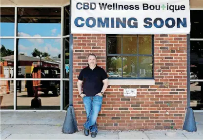  ?? [PHOTO BY ANYA MAGNUSON, THE OKLAHOMAN] ?? Todd Collins is set to open a CBD store that he hopes will stand out among others by including a juice bar, cosmetics and jewelry, organic food and products for dogs.