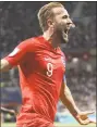  ?? Thanassis Stavrakis / Associated Press ?? England’s Harry Kane celebrates after scoring against Tunisia at the World Cup on Monday in Volgograd, Russia.