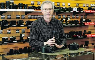  ?? LARRY WONG ?? Neil McBain, former owner of the McBain Camera store chain in Alberta, has sold the company to London Drugs. The retail photograph­y business was founded in Edmonton by Neil’s father Ross McBain in 1949.