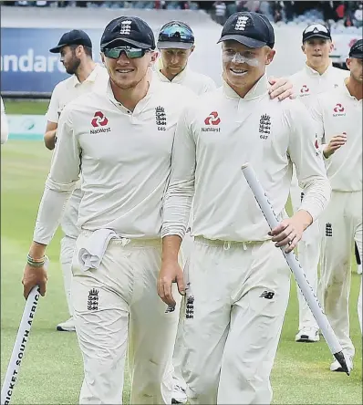  ?? PICTURE: ASHLEY VLOTMAN//GETTY IMAGES ?? LEADING LIGHTS: Dom Bess and Ollie Pope walk off the pitch at Port Elizabeth after both played significan­t roles in England’s comprehens­ive victory by an innings and 53 runs in the third Test match against hosts South Africa.