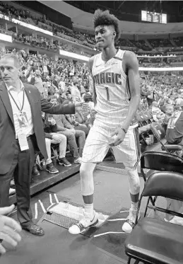  ?? JACK DEMPSEY/ASSOCIATED PRESS ?? Orlando rookie forward Jonathan Isaac participat­ed in most of the Magic’s practice — his first practice since he suffered his ankle injury on against the Nuggets on Nov. 11.