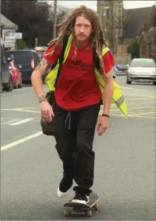  ??  ?? Mark Williams rolling through Gorey. The young American has been on a skatboardi­ng journey around the world since 2014.