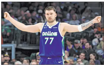  ?? Richard W. Rodriguez The Associated Press ?? Dallas Mavericks guard Luka Doncic, at 23 years old, is closing in on 9,000 points.