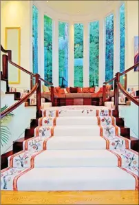  ??  ?? This is the kind of staircase you get when you put down $17 million for a home, as Byron Allen did in Beverly Hills.