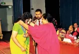  ??  ?? The Chairman of SLIOP Ms Gangani Liyanage awarding the recipients with Awards & Certificat­es.