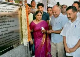  ?? — PTI ?? Delhi chief minister Arvind Kejriwal (right) with his deputy Manish Sisodia at the inaugurati­on of a synthetic athletics track in East Delhi on Sunday.