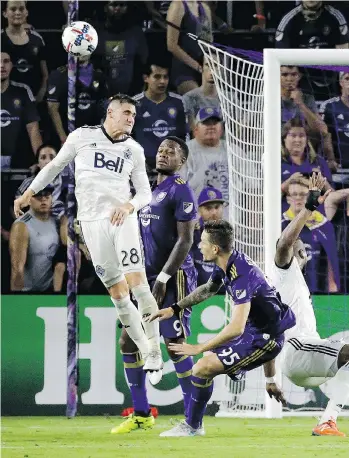  ?? AP ?? When Orlando City attackers would venture deep into Vancouver territory, Jake Nerwinski and his Whitecaps teammates managed to clear the ball from harm’s way in Saturday’s 2-1 road victory.