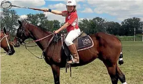  ??  ?? Rising star: Kyla Zielinkski shows off her polocrosse talents at the Lone Star Polocrosse Club in Elgin, Texas.