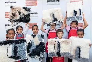  ??  ?? Children in government schools show their works of art, a product of the lessons they have learned from two renowned Emirati artists, Alia Lootah and Hind bin Demaithan.