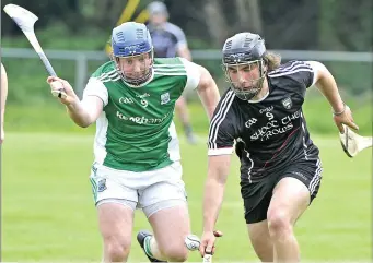  ??  ?? Gary Cadden of Sligo in action with Fermanagh’s Ryan Bogue in Tourlestra­ne.