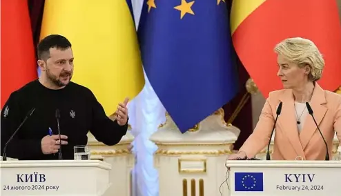  ?? ?? Ukrainian President Volodymyr Zelenskyy and European Commission chief Ursula von der Leyen in Kyiv, Ukraine on the second anniversar­y of Russia's full-scale invasion.