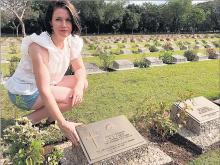  ??  ?? INSPIRATIO­N: Cemetery. Member for Lowan Emma Kealy at the graveside of Hamilton Lamb at Thanbyuzay­at War