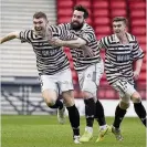  ??  ?? Late winner Ryan McGeever nets