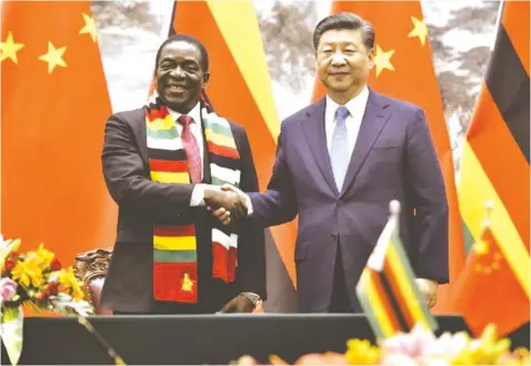  ??  ?? President Emmerson Mnangagwa (Left) with Chinese President Xi Jinping as they pose for the media after a signing ceremony at the Great Hall of the People in Beijing. This week, Harare and Beijing will have yet another round of bilateral talks as the two countries seek to deepen their economic relations.