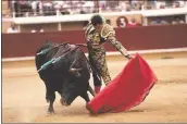  ?? GETTY IMAGES ?? Spanish matador Daniel Luque performs a pass on a Robert Marge bull at Marcel Dangou arena in southweste­rn France during the Fetes de Bayonne.