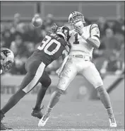  ?? Joe Sargent Getty Images ?? CAM NEWTON of the Carolina Panthers is hit by T.J. Watt of the Pittsburgh Steelers in the first half.