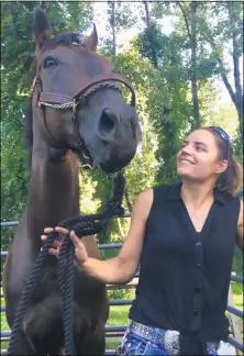  ?? PHOTO PROVIDED ?? TRF Program Developmen­t Manager Chelsea O’Reilly and Uptown Joe, TRF equine Ambassador.