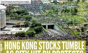  ??  ?? Tens of thousands of protesters have crippled roads around Hong Kong’s legislativ­e building