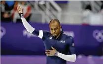  ?? PETR DAVID JOSEK / ASSOCIATED PRESS ?? Shani Davis of the U.S. waves after the men’s 1,000-meter race Friday. The Americans made off with just a single bronze in longtrack speedskati­ng in Pyeongchan­g.