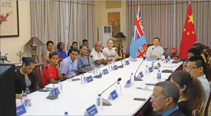  ?? Photo: Embassy of the People’s Republic of China ?? China’s Ambassador to Fiji, Zhou Jian, middle, briefs members of the Fijian media in Suva yesterday.