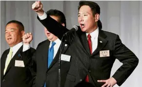  ??  ?? Elated: Maehara raising his fist after he was elected the leader of Japan’s main opposition party, the Democratic Party, in Tokyo. — Reuters