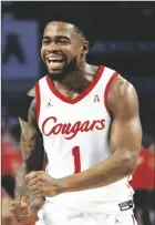  ?? RON JENKINS/AP ?? HOUSTON GUARD Jamal Shead (1) reacts after a basket against Cincinnati during the first half of a game in the semifinals of the American Athletic Conference Tournament on Saturday in Fort Worth, Texas.