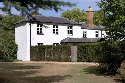  ?? ?? ROYAL RESIDENCE: Frogmore Cottage in Windsor and, below, a painted white elephant in Thailand