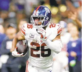  ?? TYLER KAUFMAN/AP ?? Giants running back Saquon Barkley, a former Whitehall High star, tested positive on Wednesday, coach Joe Judge said. Barkley was among a group of players who were positive on rapid tests and were awaiting PCR results. Barkley is vaccinated.