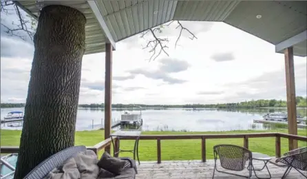  ?? ADAM GAGNON, SPECIAL TO THE RECORD ?? View of Puslinch Lake from the back deck of 11 Swastika Trail, Puslinch. This home is one of the five that is in The Lakeside Living 2017 Home Tour.